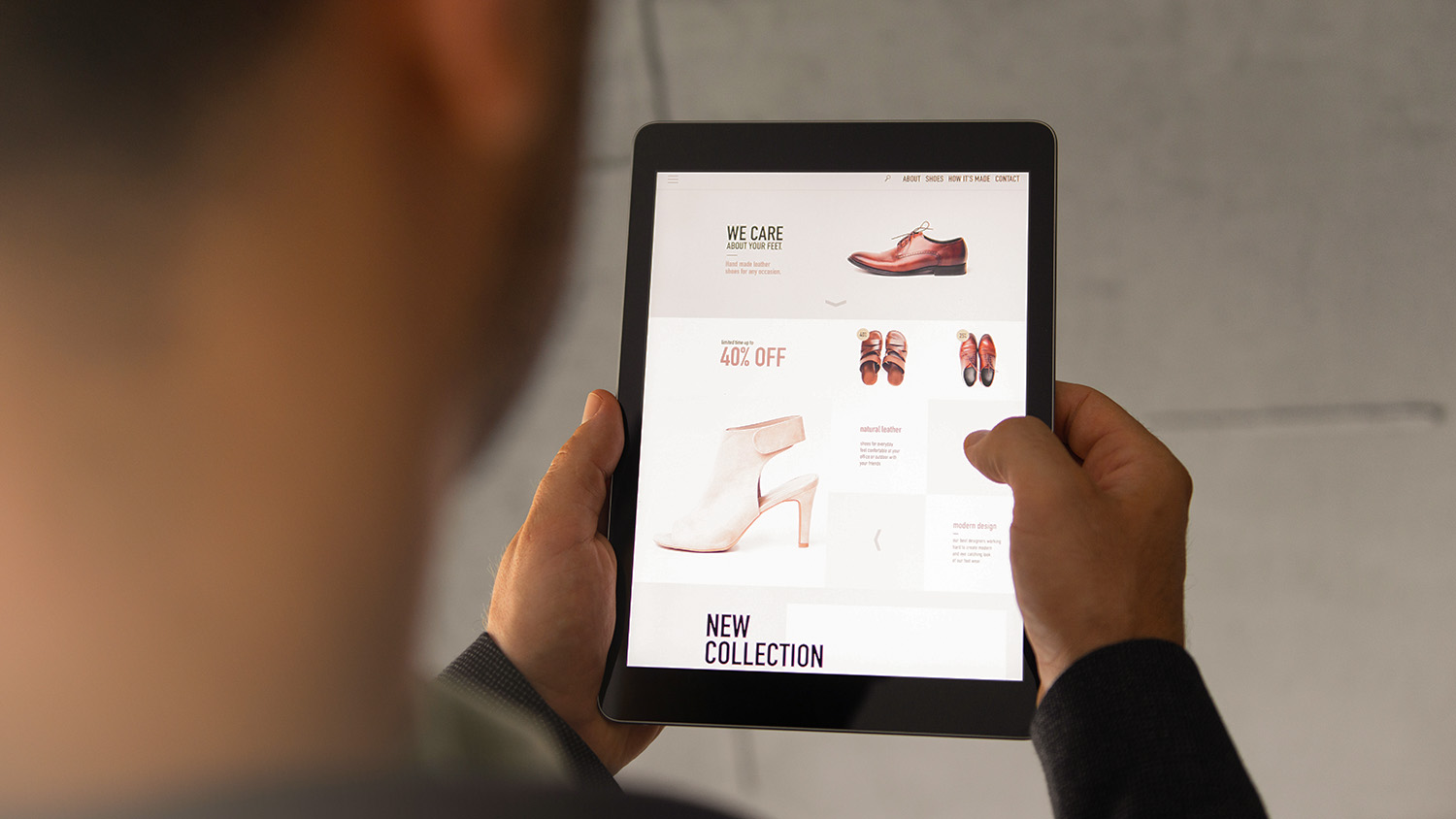 Someone shopping online on a tablet.