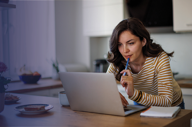 Woman looking at a computer.